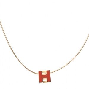 Hermes   Gold Lacquered Cage d'H Pendant Necklace